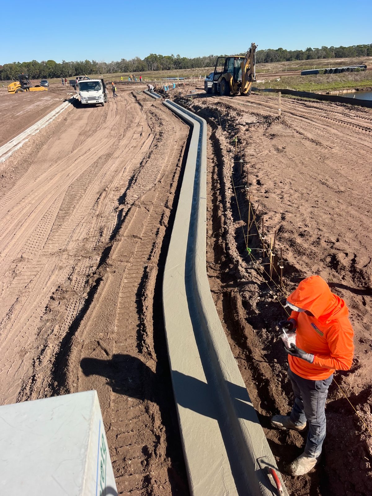 Slip-formed machine curb curving through a new residential development in Lakewood Ranch, FL