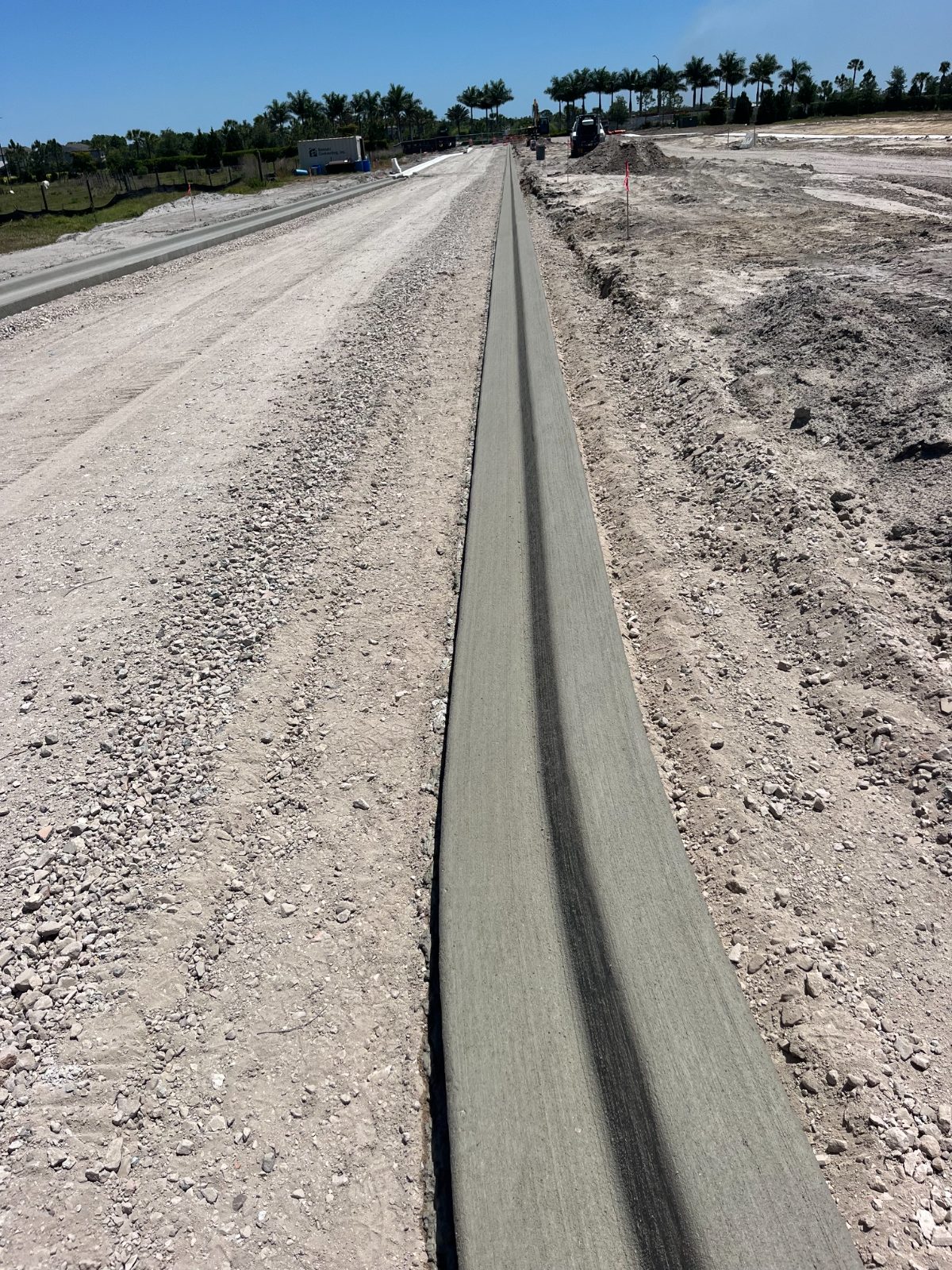 Slip-formed median curb on a new road south of Sarasota